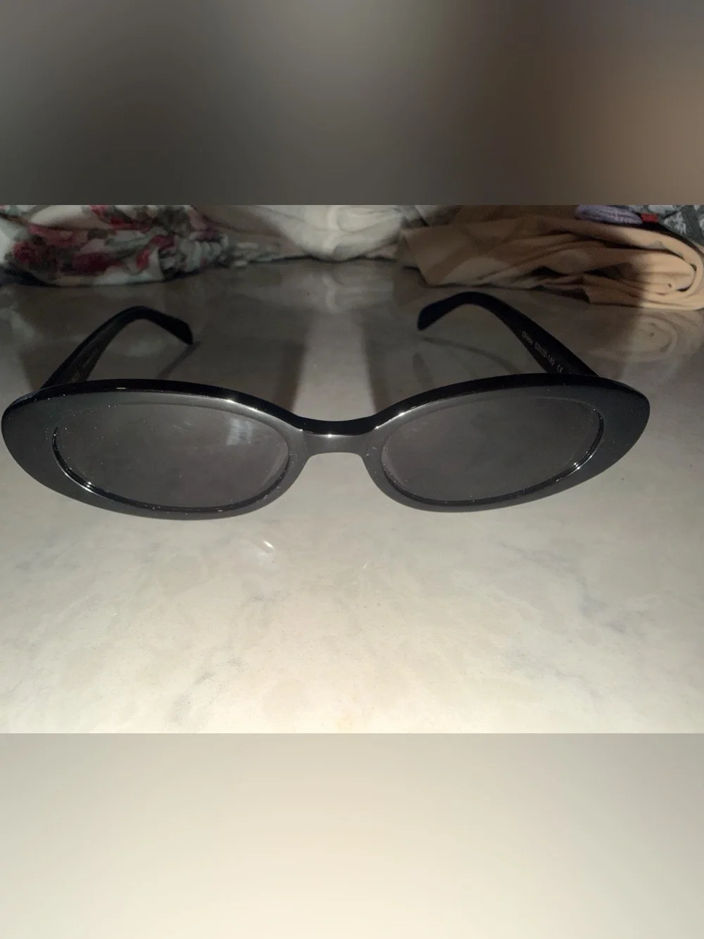 Karen Wazen “Olivia” Classic Black Oval Sunglasses